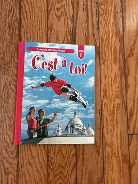 C’est à toi! French Listening Activities Manual EMC 1 Workbook Like New